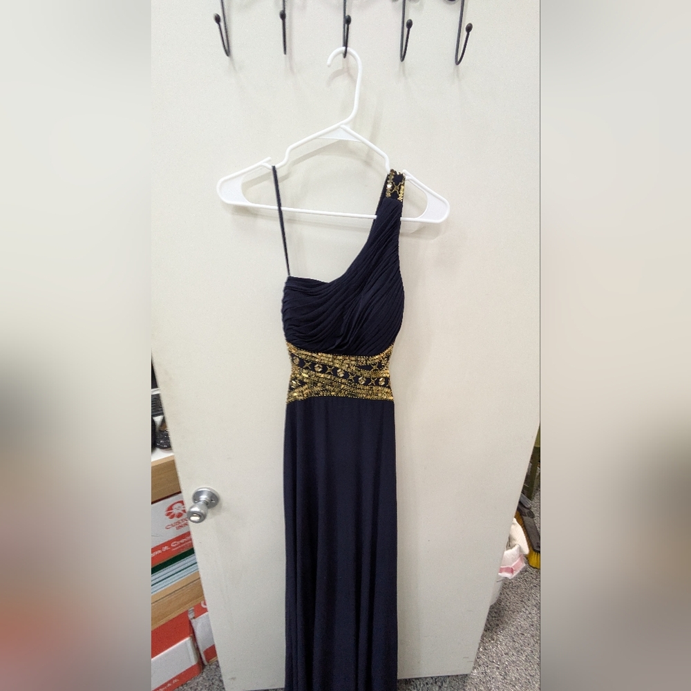 Betsy and Adam Long goddess dress navy blue with gold sequins.